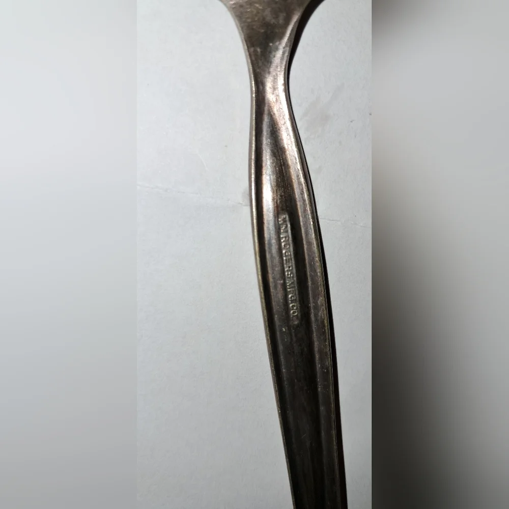 WM ROGERS MFG. CO. serated tip Spoon